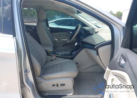 2016 Ford Escape Titanium z USA, uszkodzony, nr VIN 1FMCU0J94GUC74363